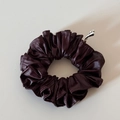Close-up of deep burgundy faux leather scrunchie with soft folds and elegant texture - Burgundy Leather Scrunchie
