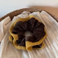 Detail of dark brown velvet scrunchie with yellow knitted lace edges in a basket - Coffee Velvet Yellow Edge Scrunchie