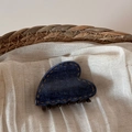 Detail of heart-shaped denim hair claw clip with contrast yellow stitching and brown teeth - Denim Blue - Heart Claw