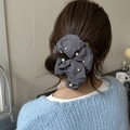 Grey scrunchie with white faux pearls on a low bun hairstyle, French style hair tie - Gray