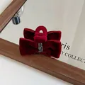 Close-up of wine red velvet bow hair claw clip with sparkling silver rhinestones - Red