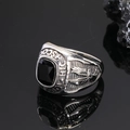Macro detail of vintage eagle ring with black gemstone and engraved high school motifs - US 7 / Steel Color Black Gemstone