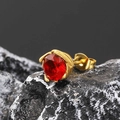 Macro shot of a faceted red ruby stud earring set in a vintage golden leaf-shaped base - Gold Tone Red Zircon (Single)