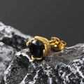 Macro shot of gold-plated stud earring with six-claw black gemstone on a textured rock - Gold Tone Black Zircon (Single)