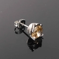 Macro view of a champagne gemstone stud earring with retro silver metal setting - Silver Tone Champagne Zircon (Single)