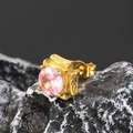 Macro shot of single pink zircon earring with vintage floral engravings on gold setting - Gold Pink Zirconia