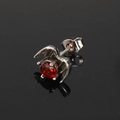 Macro detail of gothic bat wing stud earring with red zircon and silver finish - Single Piece / Steel Red Zircon