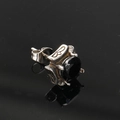 Macro detail of gothic titanium steel earring with black zircon and butterfly carvings - Steel Color Black Zircon