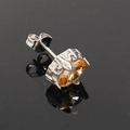 Detail view of silver steel stud earring with cross carving and amber zircon stone - Silver Tone Champagne Zircon (Single)