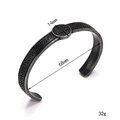 Detailed view of vintage Viking steel cuff with Celtic knots and 14mm round ornament - Celtic Knot Carved Style