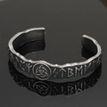 Detailed close-up of retro Viking cuff bracelet with Nordic runes and Celtic knots - Antique Thor's Hammer Style 11