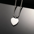 Polished silver heart-shaped perfume bottle pendant necklace on black reflective surface - Steel Color Pendant Only (Without Chain)