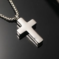 Detailed close-up of a polished silver cross pendant necklace with a sleek box chain - Steel Color Pendant (Pendant Only (Without Chain))