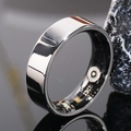 Macro view of smart ring sensors and interior electronic components on mirror base - US 7 / 7mm / Steel