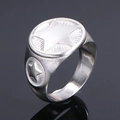 Macro shot of brushed titanium steel ring for men with star engravings and dark reflection - US 7 / Steel
