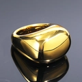 Macro shot of gold dome ring with polished mirror finish and symmetric reflection - US 7 / Gold