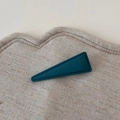 Detail of matte teal triangular hair clip featuring leather texture and fine stitching work - Matte Dark Green Triangle Clip