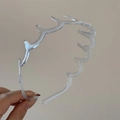 Dettaglio del cerchietto trasparente effetto jelly con denti ondulati antiscivolo per capelli - Tipo Dentato / Grigio