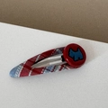Close-up of red plaid fabric hair clip with a blue Scottish terrier button detail - Red Blue Plaid - Dog Shape BB Clip