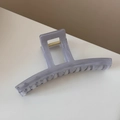 Close-up of translucent grey-purple large claw clip with square cutout and gold spring - Jelly Transparent Gray