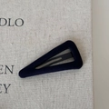 Macro detail of minimalist black fabric wrapped triangle hair clip with fine woven texture - Hollow Triangle-Navy Blue
