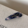 Detail of plaid fabric hair clip featuring classic blue and red Scottish tartan texture - Hollow Teardrop / Pink Blue Plaid Hollow Waterdrop Clip