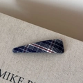 Close-up of a blue and red plaid fabric BB hair clip on a textured display box - Solid Triangle / Pink Blue Plaid Solid Triangle Clip