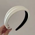 Detailed close-up of textured off-white PU leather headband with non-slip black lining - White