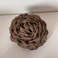 Detailed close-up of a chiffon rose hair claw featuring black polka dots on brown fabric - Polka Dot Claw - Light Coffee