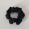 Macro shot of black and white polka dot pattern on pleated cotton scrunchie hair tie - Black Polka Dot