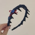 Detail of navy plaid headband featuring red bow, blue button and non-slip inner teeth - Navy Blue Red Bow Solid with Teeth