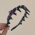 Detail showing the inner teeth of the navy plaid headband with a red bow and blue button - Navy Blue Red Bow Plaid with Teeth