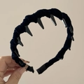 Detailed close-up of a black velvet headband with sharp wave teeth punk style design - Navy Blue