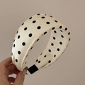 Close-up of retro cream padded headband with black polka dot patterns for women - Padded Headband / White
