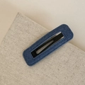 Detailed view of the dark blue denim fabric texture on a hollow rectangular BB hair clip - Denim BB-Rectangle
