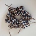 Detail of plaid scrunchie with blue and brown patterns and ribbon bow decorations - Ballet Style Beige Grey Coffee Checkered