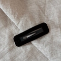 Close-up of minimalist black velvet triangle hair clip showing high-quality flocking texture - Rectangle / Brown