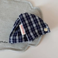 Detail of blue plaid fabric hair clip with a gold bow button and Hand Made label - Navy Blue Triangle Claw - Plaid