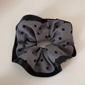 Detailed view of large grey floral scrunchie with elegant black satin trim edges - Gray Floral