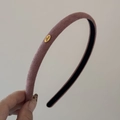 Detail of mauve velvet headband with gold Love metal plate and soft texture - Dusty Pink