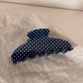 Detailed view of the wavy fan-shaped navy blue hair claw with white polka dots on linen fabric - Fan-shaped Claw Clip / Navy Blue