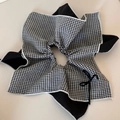 Detail of large gingham and black fabric scrunchie with a small delicate bow - Black Ribbon Bow Square Loop