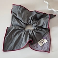 Detail of grey fabric hair tie with floral patch, purple ribbon bow and brand label tag - Grey Purple Series-Grey Square Scrunchie