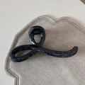 Detail of grey marble resin hair claw clip with metallic spring on linen background - Grey Marble Wave