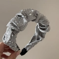 Close-up of grey velvet headband featuring sparkling rhinestones and twisted fabric detail - Silver Gray Satin Rhinestone Headband