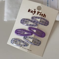 Detail of 6-piece purple hair clip set with wavy checkered patterns and floral prints - Dark Purple
