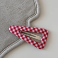 Close-up of red and white gingham fabric snap hair clip on soft textured background - Plaid Triangle BB-Red White