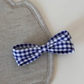 Detail of blue and white gingham bow hair clip on a textured linen background mat - Blue Plaid - Duckbill Clip