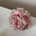 Detail of light pink mesh scrunchie with white polka dots and delicate lace trim - Pink