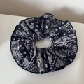 Detail of navy blue paisley print scrunchie with lace trim for vintage hair styling - Navy Blue Paisley Scrunchie
